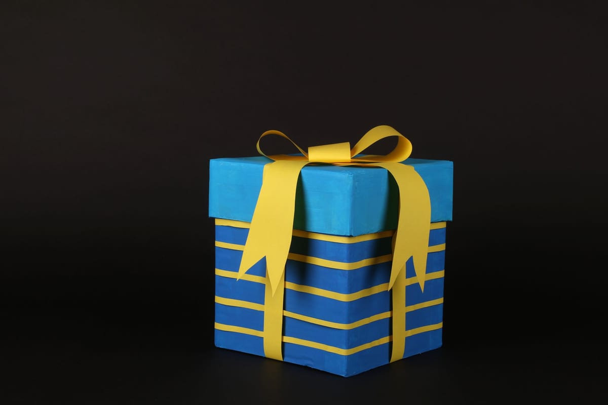 The best birthday gifts for 2026 wrapped with ribbon and confetti